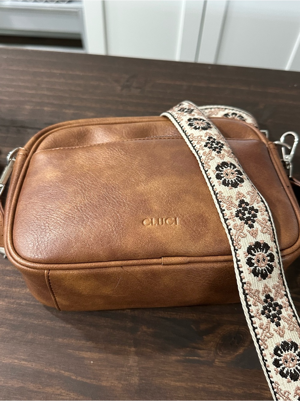 Embossed CLUCI Tan Leather Crossbody with Floral Webbing Strap